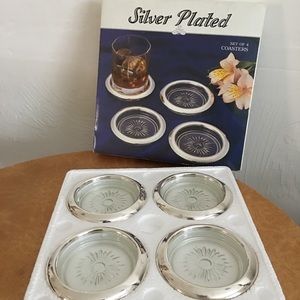 Silver plated rimmed coasters with box.